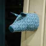 Cabeça de porco em lã