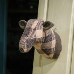 Cabeça de ovelha em lã